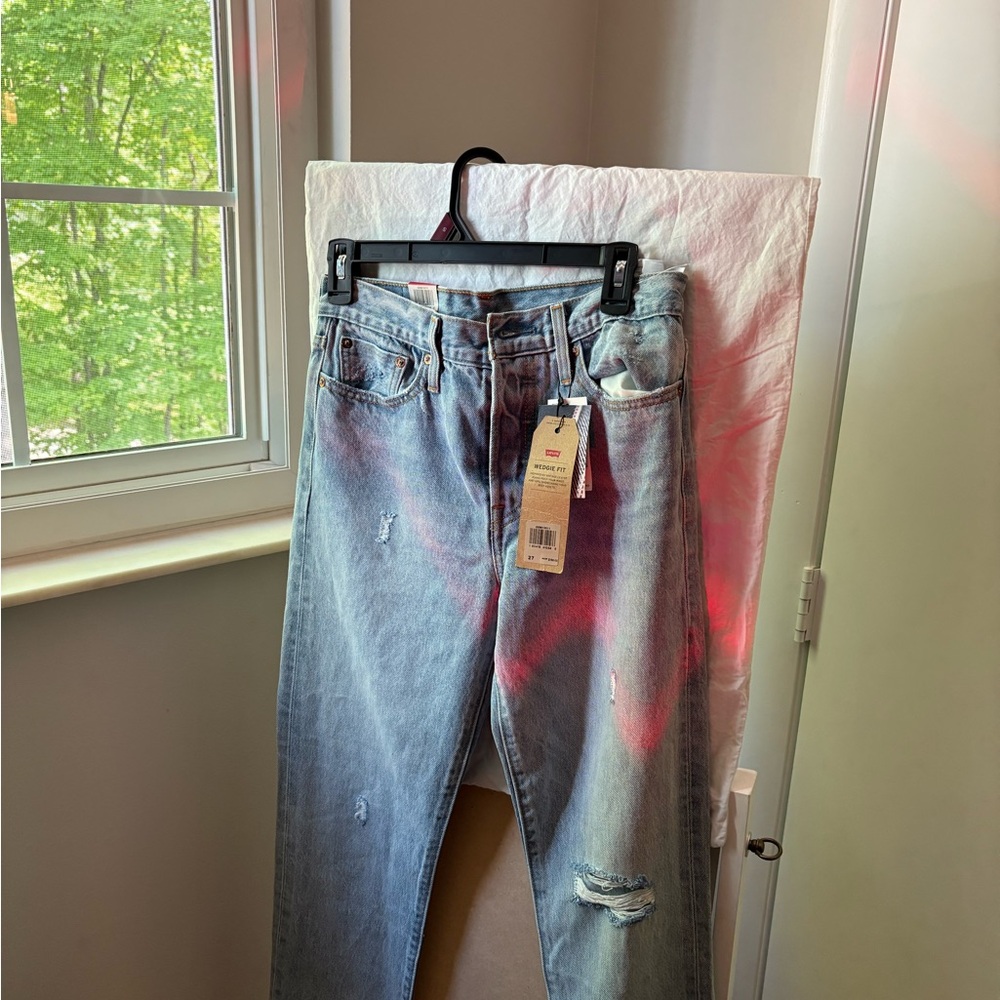 Light Wash Distressed Jeans with Tag